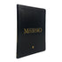 Livro "Novo Manual do Ministro" de capa preta com detalhes em dourado. — Plenitude