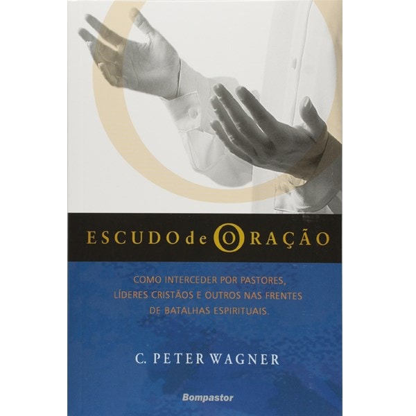 Livro Escudo de Oração de C. Peter Wagner, capa branca e azul com mãos em oração. — Plenitude