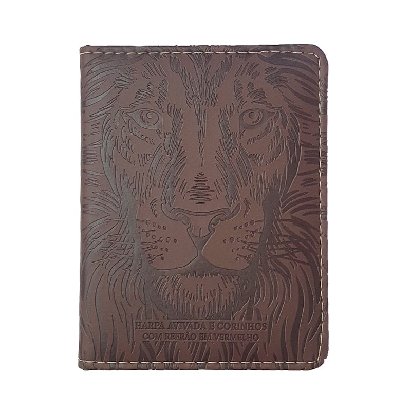 Harpa Avivada e Corinhos, letra gigante, capa marrom com desenho de rosto de leão. — Plenitude