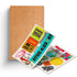 Caderno kraft com cartelas de adesivos Dunamis, incluindo "Jesus", "Atos 4:33" e outros designs variados. — Plenitude