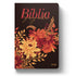 Bíblia Sagrada NVI, capa preta com buquê de flores em tons de laranja e vermelho, letra maior. — Plenitude