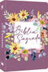 Bíblia Sagrada NVT, capa soft touch roxa com estampa floral aquarelada e título "Bíblia Sagrada" em destaque. — Plenitude