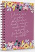 Livro Agenda Primavera Alegre, capa dura espiral roxa com ilustrações florais coloridas. — Plenitude
