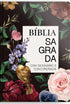 Bíblia Sagrada com capa floral escura, pássaro e flores coloridas, com dicionário e concordância. — Plenitude