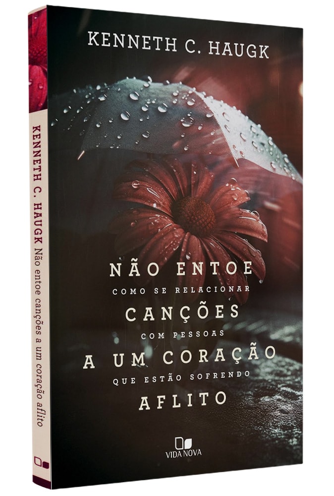 Livro de capa dura: Não Entoe Canções A Um Coração Aflito, de Kenneth C. Haugk. Capa com guarda-chuva e flor vermelha. — Plenitude