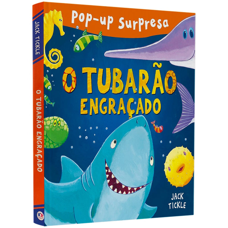 Livro pop-up "O Tubarão Engraçado", capa azul com tubarão e peixes. — Plenitude