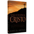 Livro "Nossa Suficiência Em Cristo" de John MacArthur, capa preta com montanha e cruz ao pôr do sol. — Plenitude