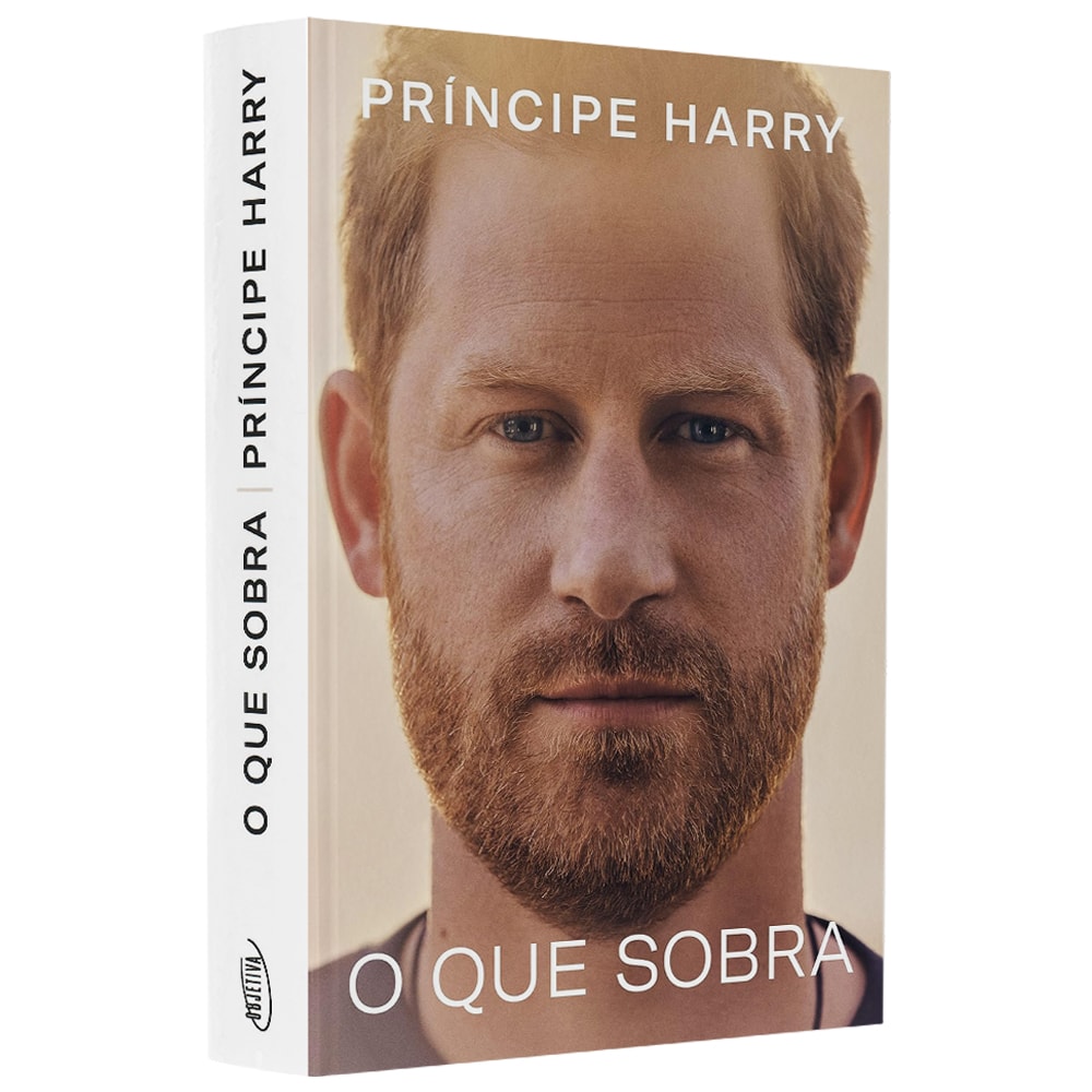 Livro de capa comum, "O Que Sobra" do Príncipe Harry, capa branca com foto de rosto do autor. — Plenitude