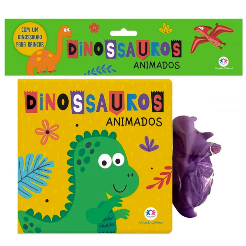 Livro de banho Dinossauros Animados, capa amarela com dinossauro verde e um dinossauro roxo de brinquedo. — Plenitude