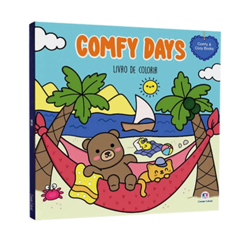 Livro de Colorir Comfy Days com capa ilustrada de urso e gato relaxando em rede na praia. — Plenitude