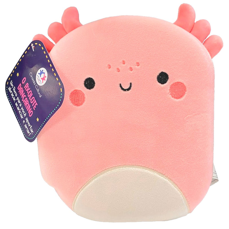 Livro O Axolote Dançarino, com capa de pelúcia rosa em formato de axolote sorridente. — Plenitude