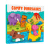 Livro de Colorir Comfy Dinosaurs com capa ilustrada de dinossauros e animais pré-históricos coloridos. — Plenitude