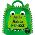 Livro Minha Maleta Feroz, capa verde em formato de dinossauro com alça de feltro. — Plenitude