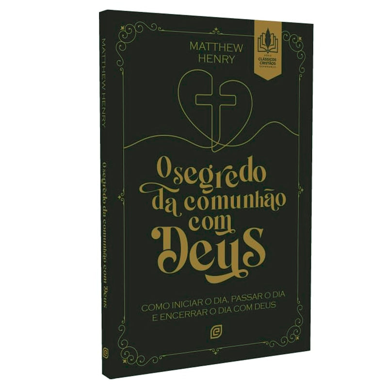 Livro O Segredo da Comunhão Com Deus, capa preta com detalhes dourados e um coração com cruz. — Plenitude