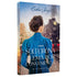 Livro "Uma Solteirona Alemã Por Conveniência" com capa azul, mulher de costas e trem a vapor. — Plenitude