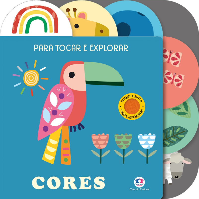 Livro tátil "Cores" da Ciranda Cultural, capa com tucano e texturas para tocar. — Plenitude