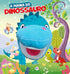 Livro infantil A Mágica do Dinossauro, capa colorida com dinossauro azul de pelúcia e outros dinossauros. — Plenitude