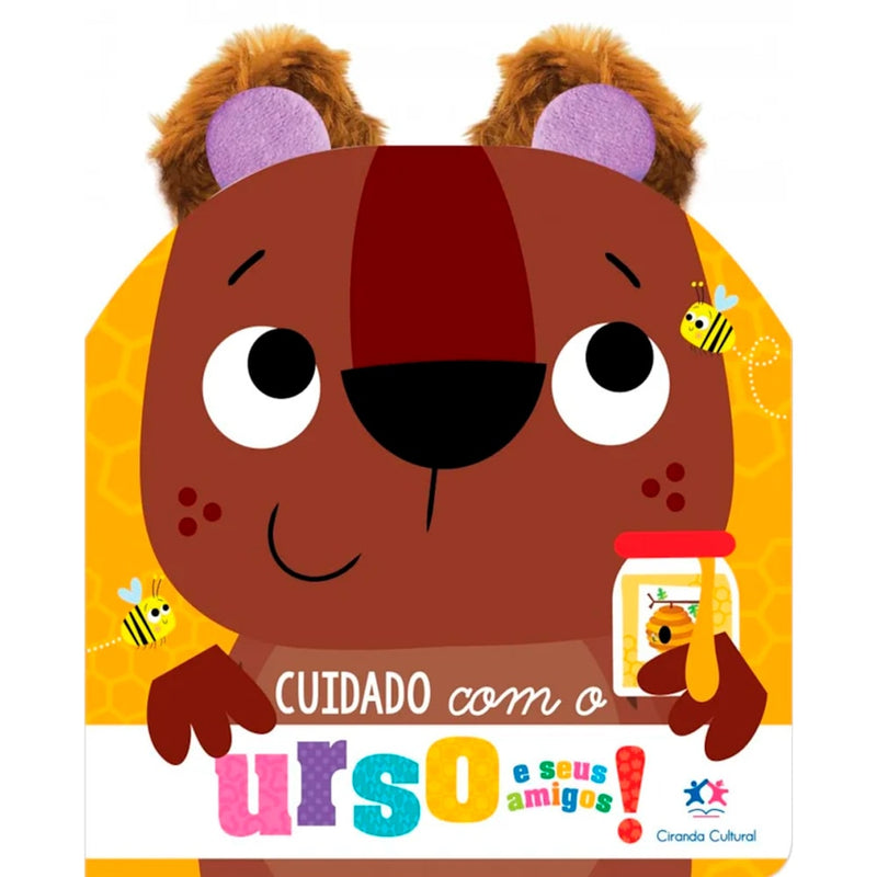 Livro infantil Cuidado Com o Urso e Seus Amigos, com orelhas de pelúcia, capa amarela com urso. — Plenitude
