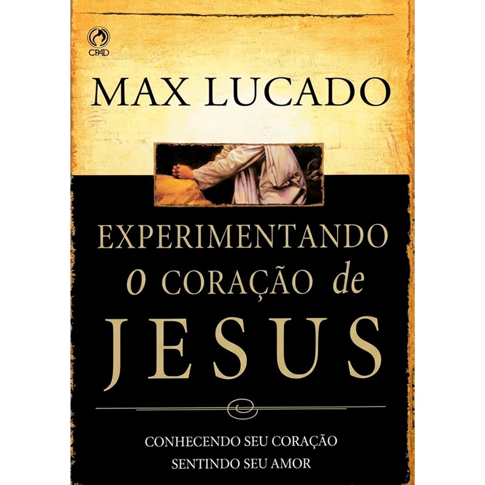 Livro Experimentando o Coração de Jesus, de Max Lucado, capa bege e preta com imagem de mãos segurando um bebê. — Plenitude