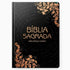 Bíblia Sagrada Harpa Avivada e Corinhos, capa dura preta com arabescos bronze e texto manuscrito. — Plenitude